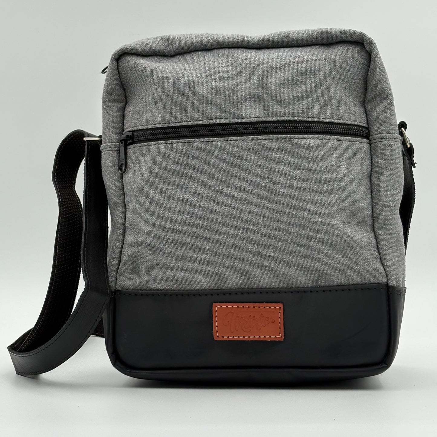 Bolso mensajero gris